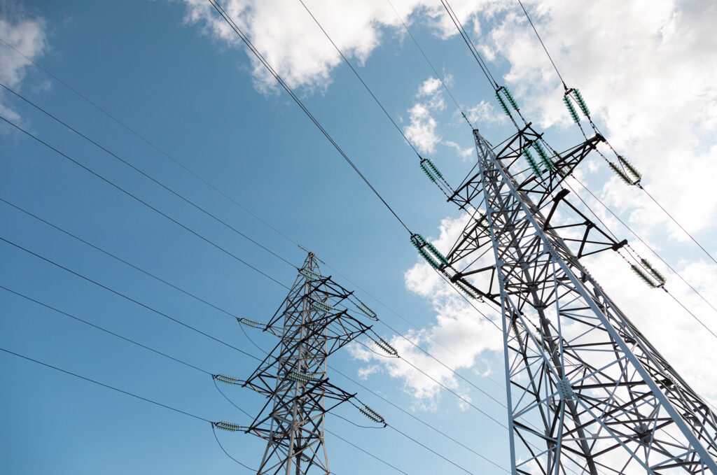 diagonal view of suspension towers against sky