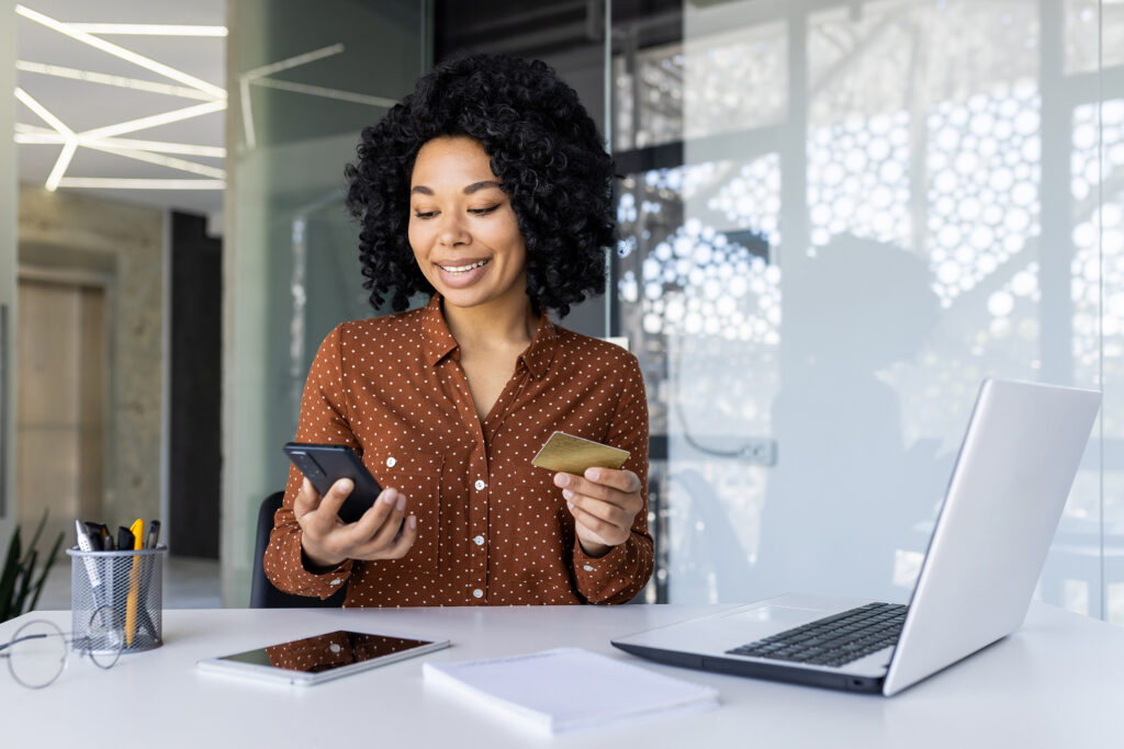 professional woman making a payment online with credit card